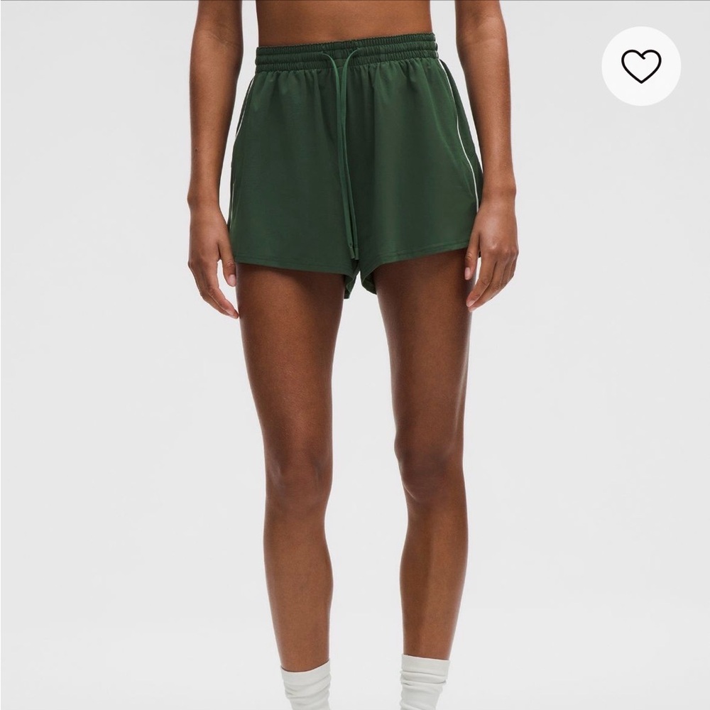Green Athletic Shorts with White Trim